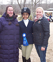 Kulkarni wins her first IEA blue ribbon and poses with her Volo coaches