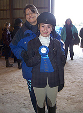 Coach Jenny Mitchell poses behind Gabi Sorrentino