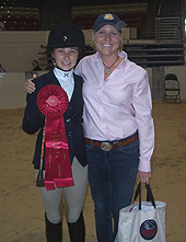 Mattie Harden of Birmingham IEA is second in team future beginner; Coach Claire Allison is on right